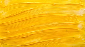 黄色颜料涂漆墙壁背景图片